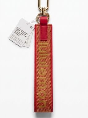 lululemon Lunar New Year Never Lost Red and Gold Logo Key Fob Strap